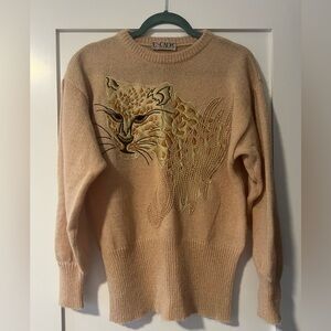 Escada sweater with lion embroidery.
